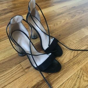 Tie-strap black heels